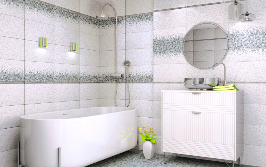 Ванная с белой плиткой, мозаичным декором и овальной ванной