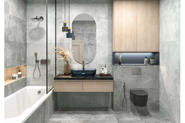 Уютная ванная с серой плиткой и подвесной раковиной